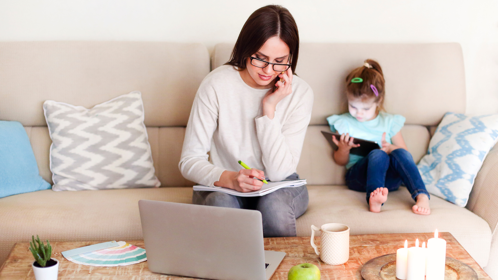 Millennial Mom multitasking as a mom and doing her career work